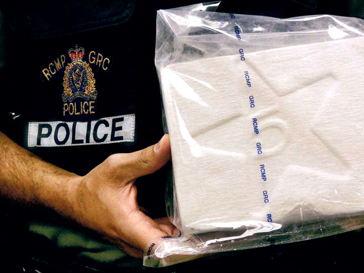 ■警方展示在今次调查行动中起出的毒品。Global